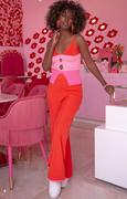 Dresy damskie - Kolorowy komplet z pęknięciami top i długie spodnie F1683, Kolor pomarańczowy, Rozmiar 2XS/XS, Fobya - Primodo.com - miniaturka - grafika 1