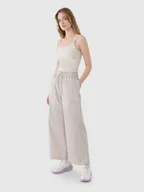 Spodnie damskie - 4F Spodnie casual z szerokimi nogawkami damskie - beżowe L - miniaturka - grafika 1