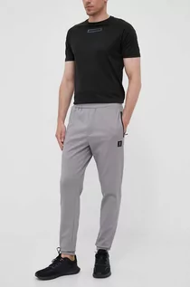 Spodnie męskie - Hummel spodnie dresowe Interval kolor szary gładkie - grafika 1