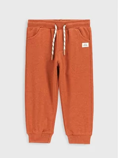 Spodnie i spodenki dla dziewczynek - Coccodrillo Spodnie dresowe ZC2120102TRN Pomarańczowy Regular Fit - grafika 1