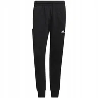Dresy męskie - Spodnie męskie adidas Essentials French Terry Tapered Cuff 3-Stripes czarne - miniaturka - grafika 1