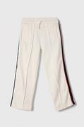 Spodnie i spodenki dla dziewczynek - Tommy Hilfiger spodnie dresowe dziecięce kolor biały wzorzyste - miniaturka - grafika 1