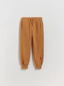 Spodnie i spodenki dla chłopców - Reserved - Dzianinowe joggery - brązowy - miniaturka - grafika 1