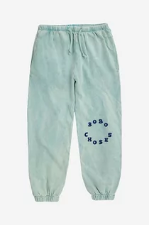 Spodnie i spodenki dla dziewczynek - Bobo Choses spodnie dresowe bawełniane dziecięce kolor niebieski z nadrukiem - grafika 1