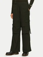 Spodnie sportowe damskie - Champion Spodnie dresowe 117503 Zielony Oversize - miniaturka - grafika 1