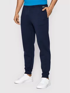 Spodnie sportowe męskie - Lacoste Spodnie dresowe XH3357 Granatowy Slim Fit - grafika 1