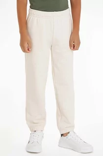 Spodnie i spodenki dla dziewczynek - Tommy Hilfiger spodnie dresowe bawełniane dziecięce kolor beżowy gładkie - grafika 1