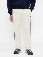 Spodnie sportowe męskie - GAP Spodnie dresowe w kolorze białym - miniaturka - grafika 1