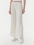 Spodnie sportowe damskie - Puma Spodnie dresowe Ess 629804 Beżowy Wide Leg - miniaturka - grafika 1