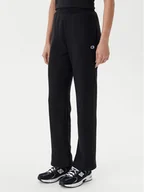 Spodnie sportowe damskie - Champion Spodnie dresowe 117983 Czarny Slim Fit - miniaturka - grafika 1