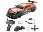 Zabawki zdalnie sterowane - DUŻY Samochód Do Driftu Auto RC Drift 1:16 2,4 GHz PARA DYM 4WD Pomarańczowy Nissan GTR LED - miniaturka - grafika 1