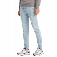 Spodnie męskie - Męskie spodnie jeansowe JOGGERY przetarcia j.niebieskie V1 OM-PADJ-0150 L - miniaturka - grafika 1