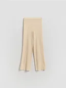 Swetry dla dziewczynek - Reserved - Dzianinowe spodnie flare - złamana biel - miniaturka - grafika 1