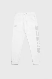 Spodnie damskie - Guess Spodnie dziecięce kolor biały z nadrukiem - grafika 1
