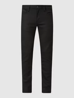 Spodnie męskie - Jeansy o kroju tapered fit z dodatkiem streczu model ‘Ozzy’ - grafika 1