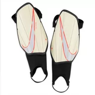 Piłka nożna - Nike, Nagolenniki, Charge Y SP2165 113, rozmiar M - miniaturka - grafika 1