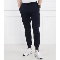 Dresy męskie - Tommy Hilfiger Spodnie dresowe FLAG LOGO | Relaxed fit - miniaturka - grafika 1