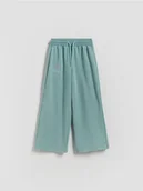 Spodnie i spodenki dla dziewczynek - Reserved - Szerokie spodnie dresowe - miętowy - miniaturka - grafika 1