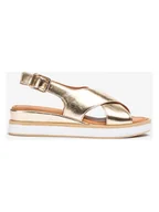 Sandały damskie - Unisa Skórzane sandały w kolorze złotym na koturnie - miniaturka - grafika 1