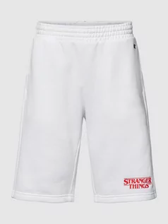 Spodnie sportowe męskie - Spodnie dresowe z wyhaftowanym logo — Champion x Stranger Things - grafika 1