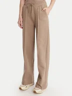 Spodnie sportowe damskie - Guess Spodnie dresowe V6RB17 K9V31 Beżowy Regular Fit - miniaturka - grafika 1