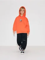 Spodnie i spodenki dla chłopców - Reserved - Joggery z bawełną - czarny - miniaturka - grafika 1