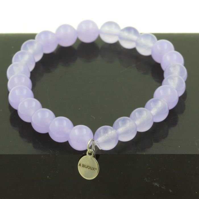Kamienie i minerały. Bransoletka z koralików lawendowego chalcedonu 8 mm. Wyprodukowano we Francji. Możliwość dostosowania rozmiaru.