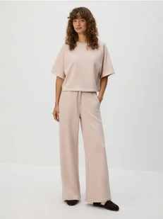 Reserved - Bawełniane spodnie dresowe - pastelowy róż - Spodnie damskie - miniaturka - grafika 1