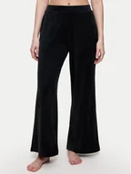Piżamy damskie - Triumph Spodnie piżamowe Sensual Velour 10225077 Czarny Wide Leg - miniaturka - grafika 1