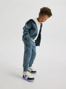Reserved - Bawełniane spodnie jogger - granatowy - Spodenki dla niemowląt - miniaturka - grafika 1