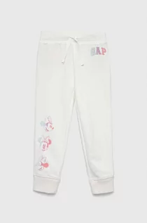 Spodnie i spodenki dla dziewczynek - GAP spodnie dresowe dziecięce x Disney kolor biały z nadrukiem - Gap - grafika 1