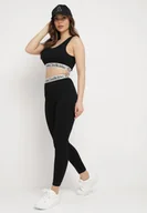 Legginsy - Czarne Elastyczne Legginsy z Szeroką Gumą w Pasie Rindama - miniaturka - grafika 1