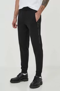Spodnie męskie - Calvin Klein spodnie dresowe kolor czarny z aplikacją - grafika 1