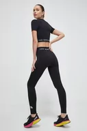 Legginsy - The North Face legginsy sportowe damskie kolor czarny gładkie - miniaturka - grafika 1