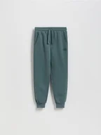 Spodnie i spodenki dla chłopców - Reserved - Joggery z bawełną - zielony - miniaturka - grafika 1
