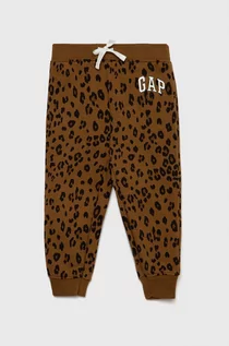Spodnie i spodenki dla dziewczynek - GAP spodnie dresowe dziecięce kolor brązowy wzorzyste - Gap - grafika 1