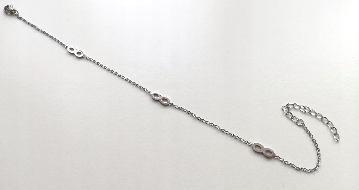 BRANSOLETKA NA NOGĘ znak nieskończoność ZŁOTA STAL