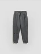 Spodnie i spodenki dla chłopców - Reserved - Bawełniane spodnie jogger - ciemnoszary - miniaturka - grafika 1