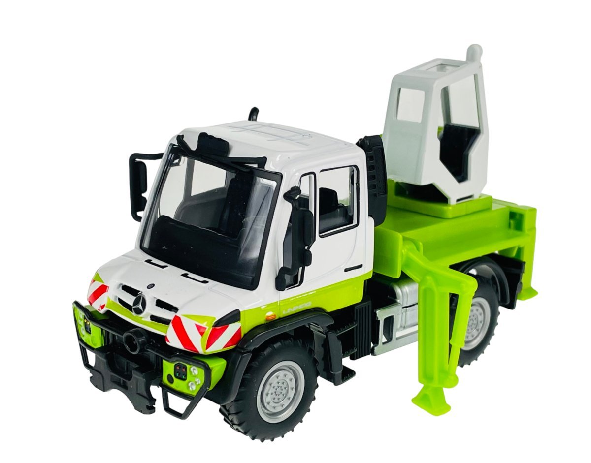 MAISTO MERCEDES-BENZ UNIMOG BIAŁY KOPARKA 1:43 21238