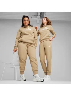 Puma Spodnie dresowe "ESS" w kolorze beżowym - Spodnie sportowe damskie - miniaturka - grafika 1