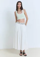 Bluzy damskie - MANGO - Dzianinowy top z kontrastowym wykończeniem miętowa zieleń - L - Kobieta - miniaturka - grafika 1