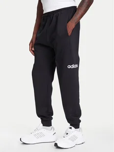adidas Spodnie dresowe Essentials Linear Fleece JN1786 Czarny Regular Fit - Spodnie sportowe męskie - miniaturka - grafika 1