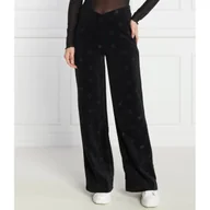 Dresy damskie - HUGO Spodnie dresowe Navalia | flare fit - miniaturka - grafika 1