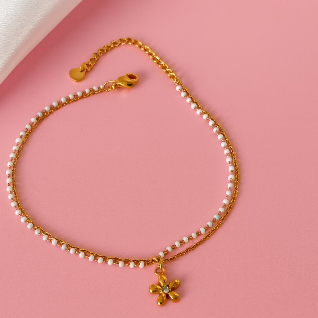 Podwójna bransoletka z pastelowymi koralikami i kwiatuszkiem z cyrkonią