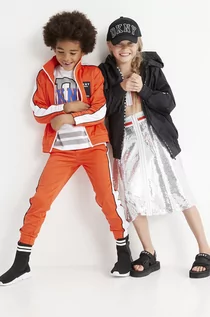 Spodnie damskie - DKNY spodnie dziecięce kolor pomarańczowy gładkie - - grafika 1