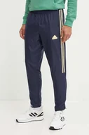 Spodnie męskie - adidas spodnie dresowe Tiro kolor granatowy z aplikacją IW3582 - miniaturka - grafika 1