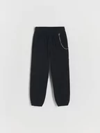 Spodnie i spodenki dla dziewczynek - Reserved - Spodnie z łańcuszkiem - czarny - miniaturka - grafika 1