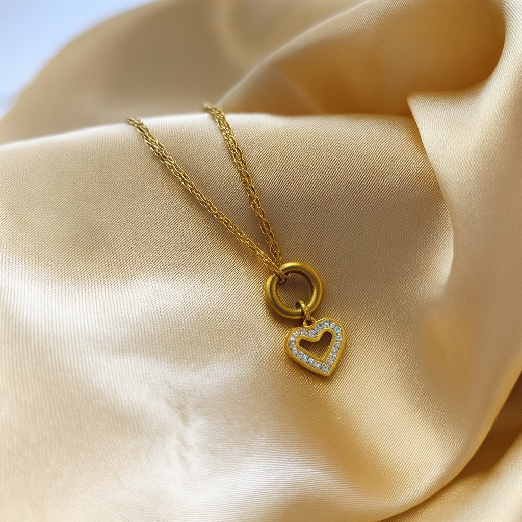 Złota bransoletka z kółkiem i zawieszką serce