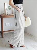 Spodnie damskie - Damskie asymetryczne spodnie z wiązanym pasem - Biały - miniaturka - grafika 1