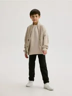 Spodnie i spodenki dla chłopców - Reserved - Elastyczne spodnie regular - czarny - miniaturka - grafika 1